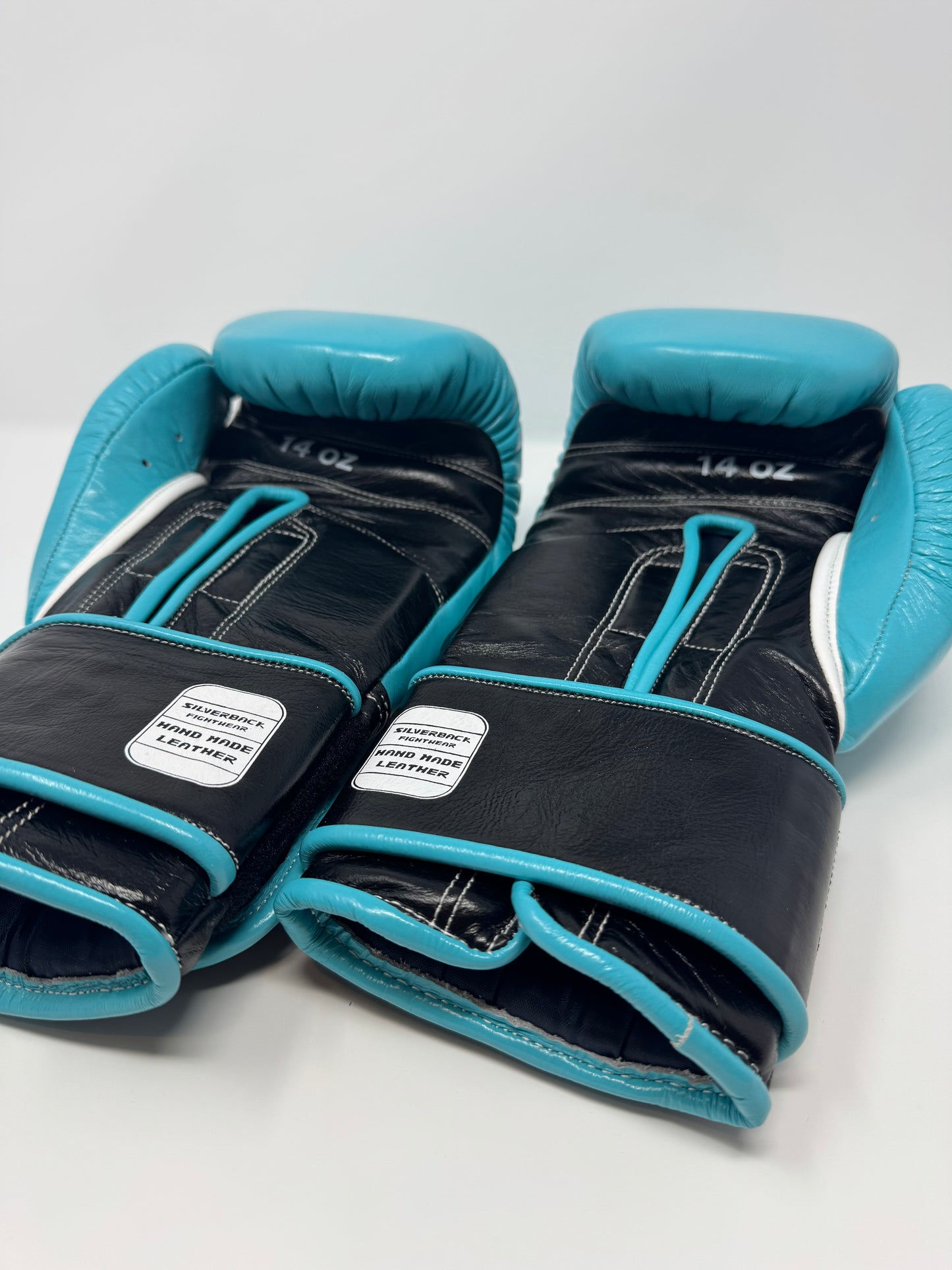 GANTS DE BOXE SILVERBACK - TM-200 - BLEU LASER / NOIR