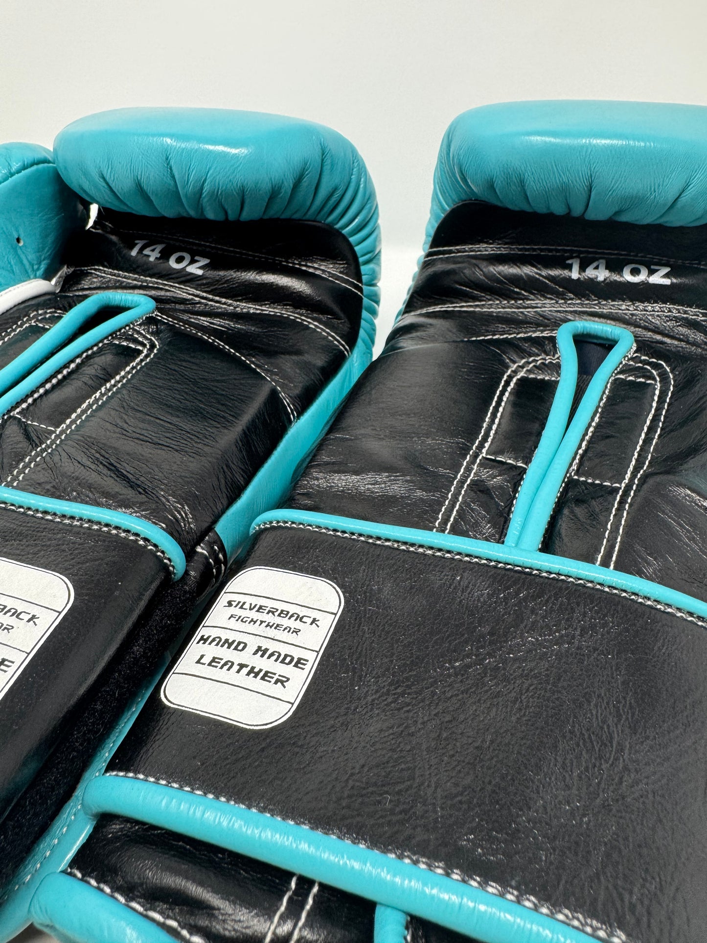GANTS DE BOXE SILVERBACK - TM-200 - BLEU LASER / NOIR